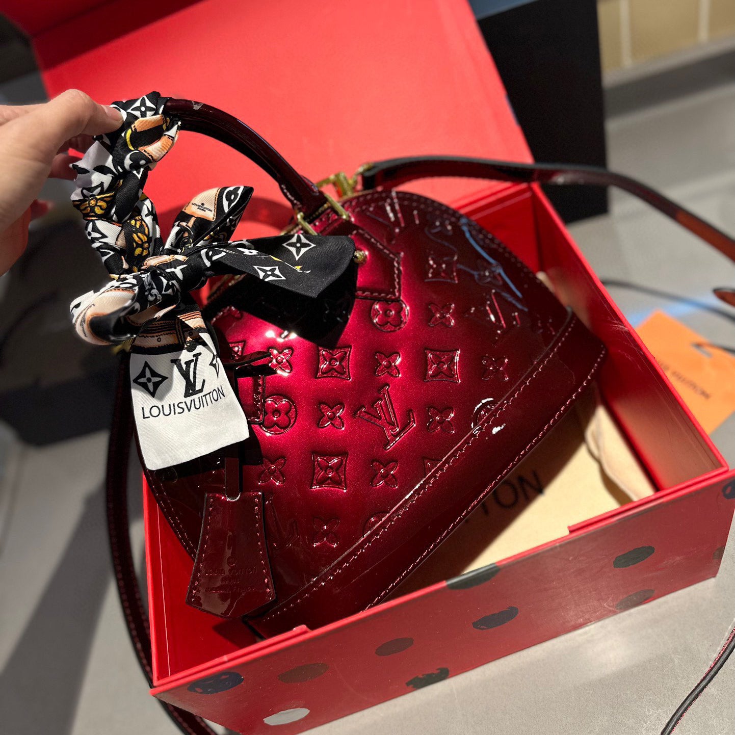 Embossed bright leather Alma shell bag 1824041702