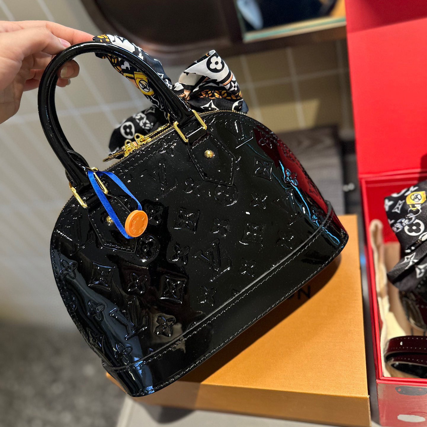 Embossed bright leather Alma shell bag 1824041702