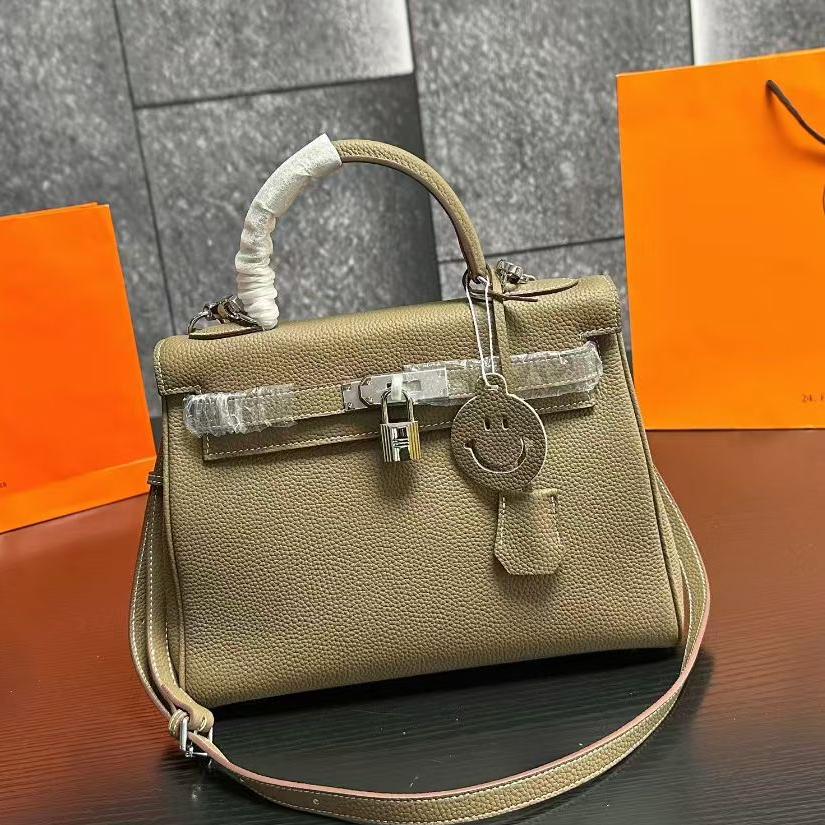 Hms fashionable cowhide handbag 0725091703