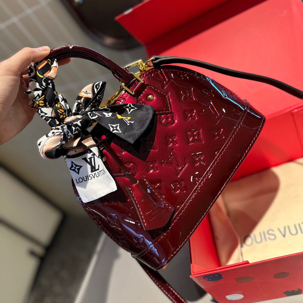 Embossed bright leather Alma shell bag 1824041702