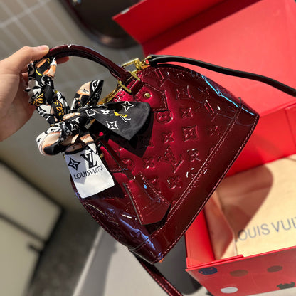 Embossed bright leather Alma shell bag 1824041702