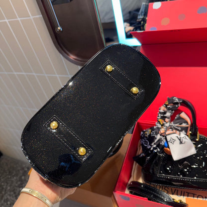 Embossed bright leather Alma shell bag 1824041702