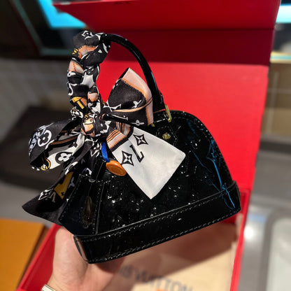 Embossed bright leather Alma shell bag 1824041702