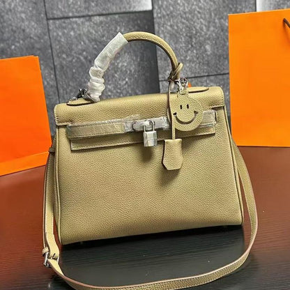Hms fashionable cowhide handbag 0725091703