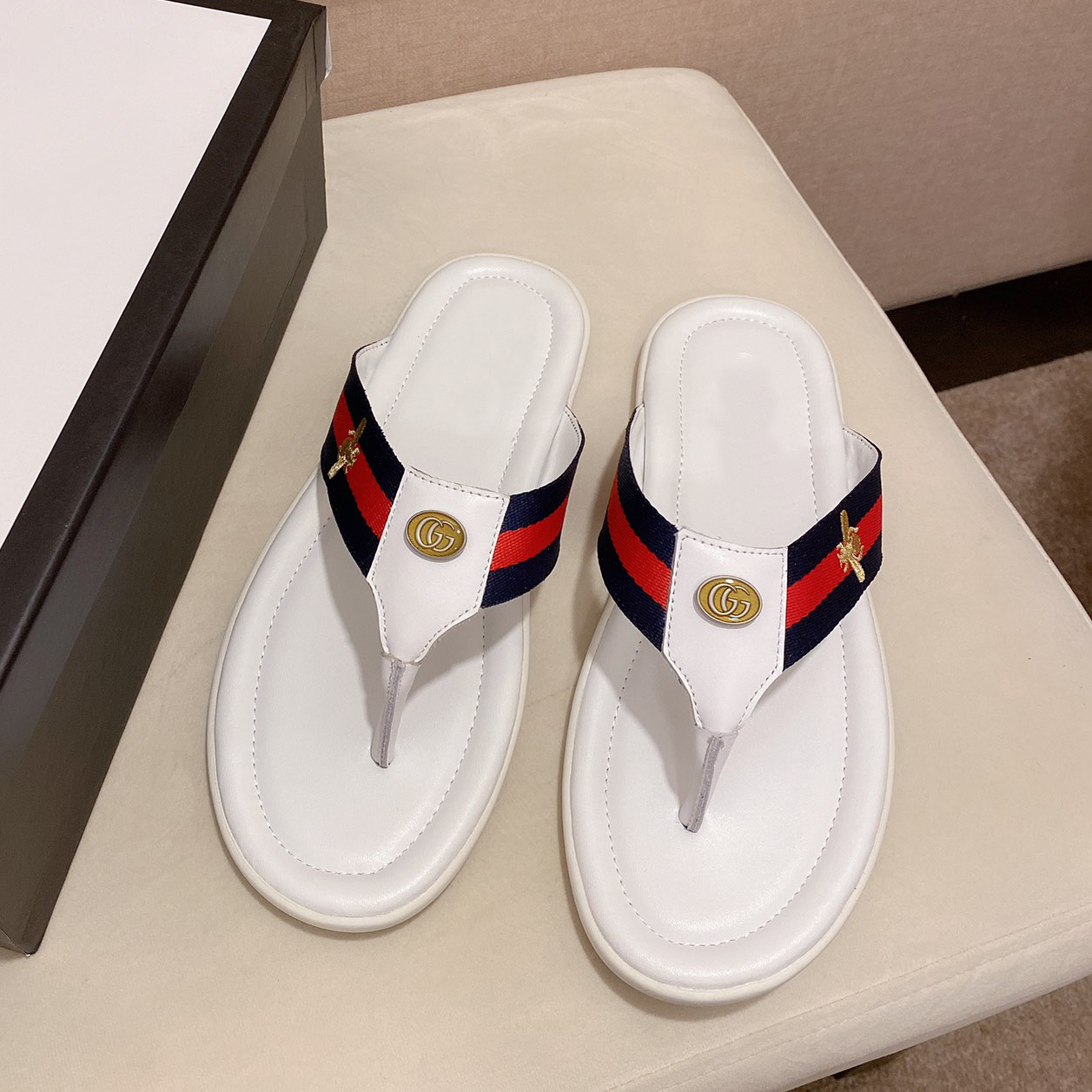 Leather brand flip flops