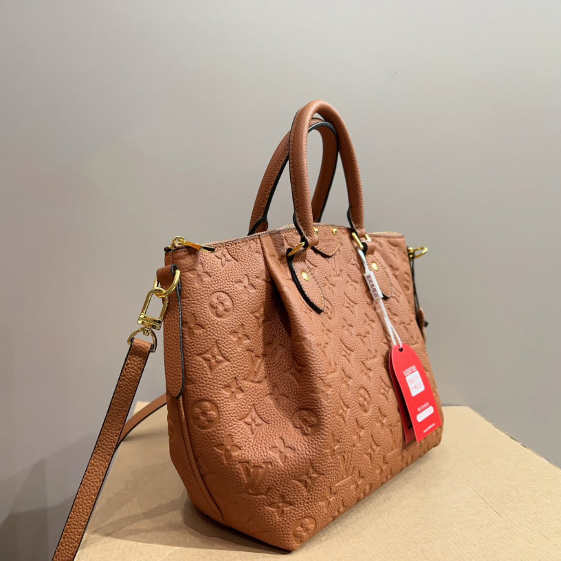 L family embossed flowerpot bag 1824040302