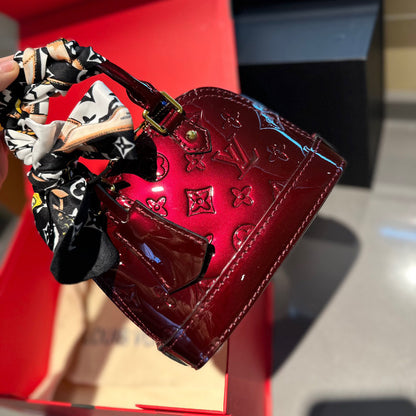 Embossed bright leather Alma shell bag 1824041702