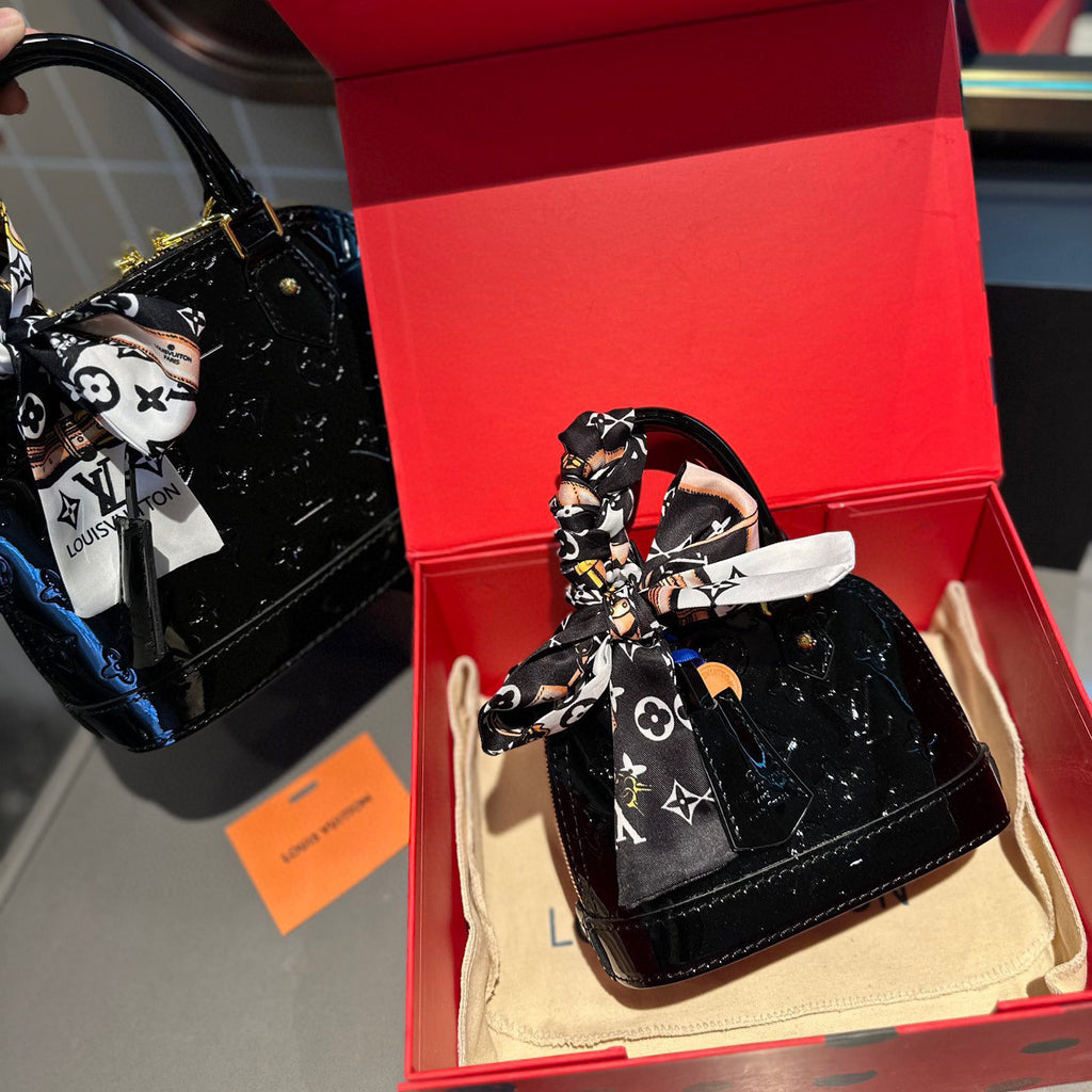 Embossed bright leather Alma shell bag 1824041702