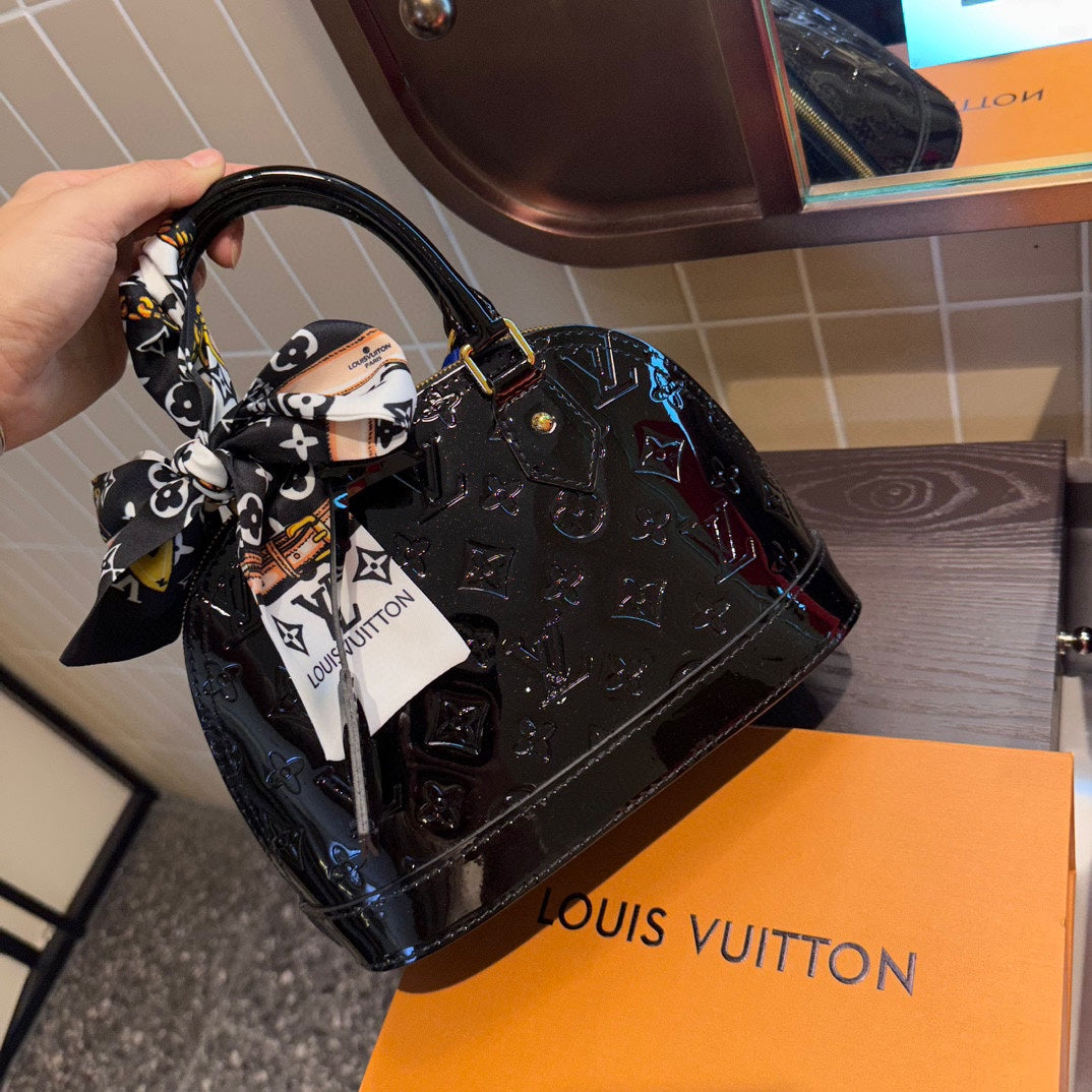 Embossed bright leather Alma shell bag 1824041702