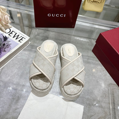 GG cross-upper thick-soled flip-flops 0725052901