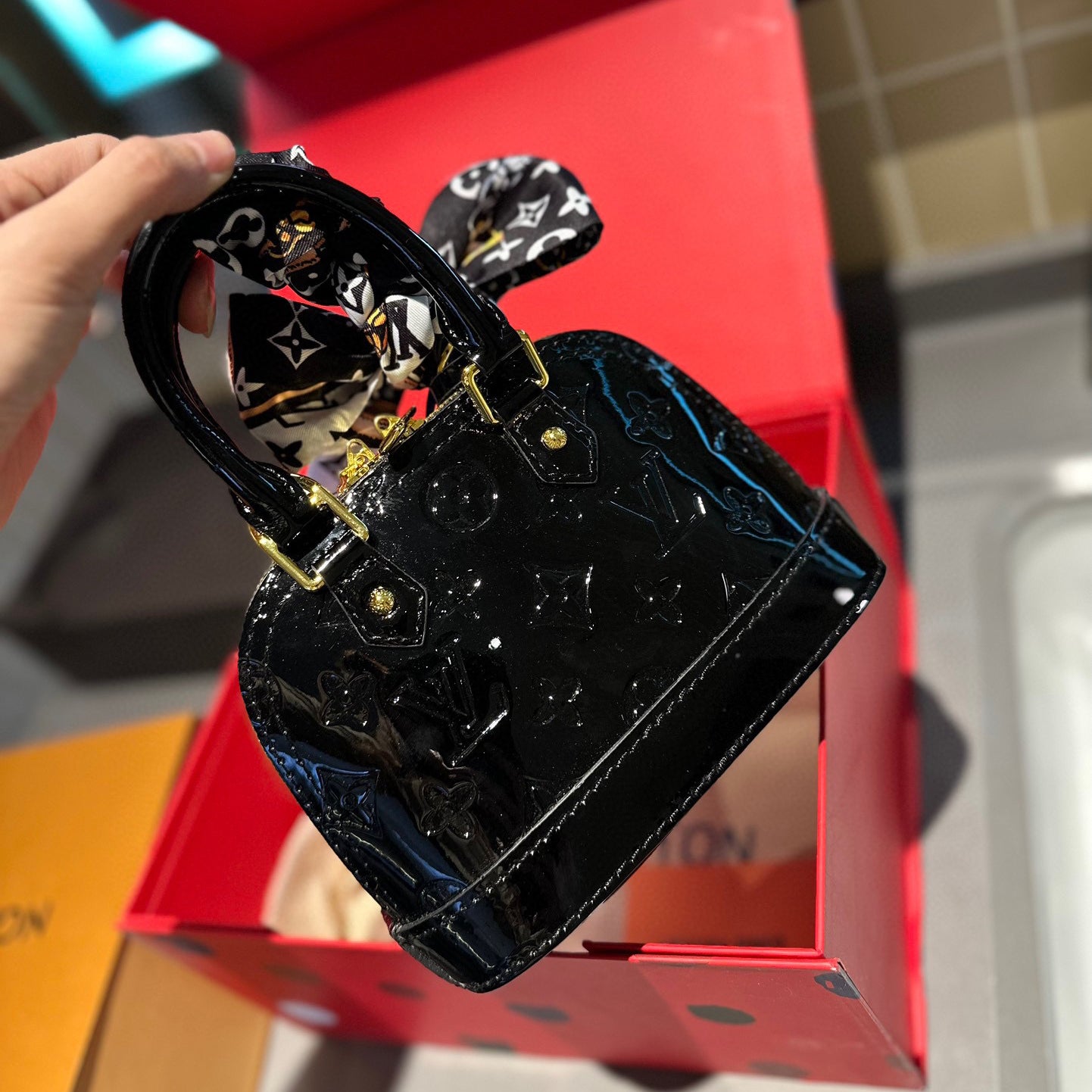 Embossed bright leather Alma shell bag 1824041702