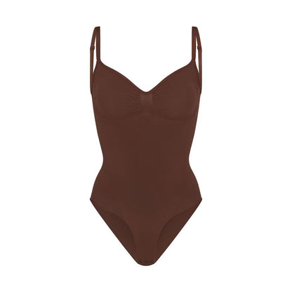 Skims Kardashian with the same sexy non-marking one-piece shapewear waist belly triangle hip thong